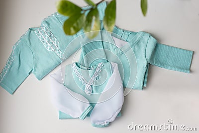 Blue newborn Clothing hand made Stock Photo