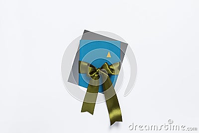 Notebook with gift ribbon coming out of frame on white background Stock Photo
