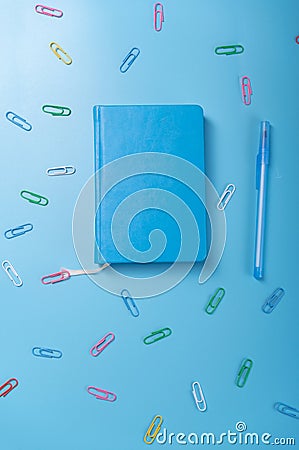 Blue notebook and pen. Write down ideas and thoughts. Collect thoughts. Stock Photo