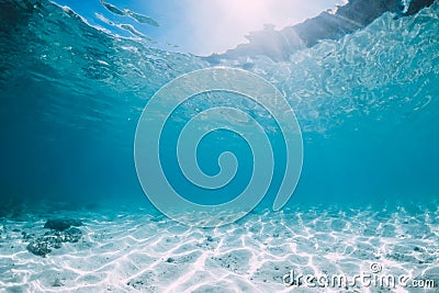 Blue ocean with white sand bottom underwater in Hawaii Stock Photo