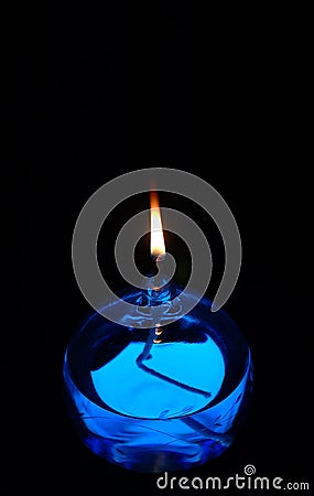 Blue Oil Candle Stock Photo