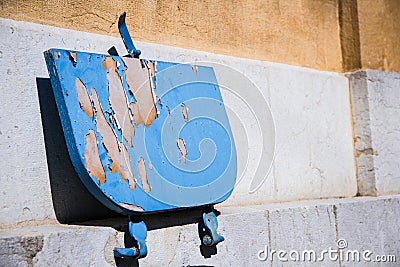 Blue old fold-able street chair at NeuchÃ¢tel Switzerland Stock Photo