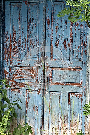 Elements of the texture of the walls of old houses of a farmer of the last century on a ranch in nature on a sunny day. Stock Photo