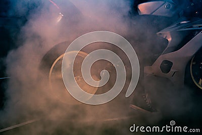 Large Cloud of Smoke from Motorcycle burnout Stock Photo
