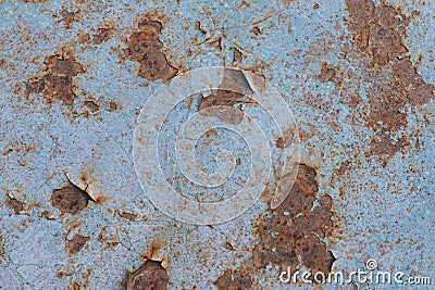 Blue paint flaking and cracking texture on rusty metal. Stock Photo