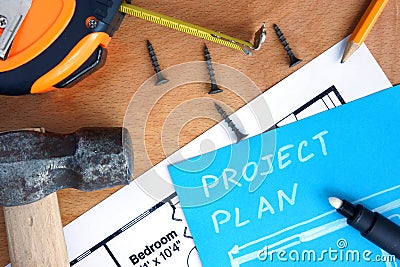 Blue paper with home improvement project plan, tools kit Stock Photo