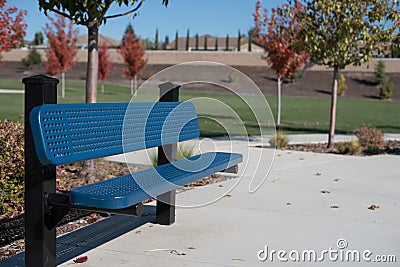 Blue Park Bench Stock Photo