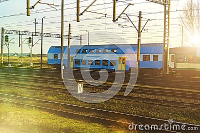 The blue passenger double-decker train. Stock Photo