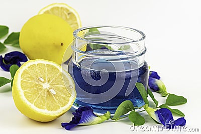 Blue pea flower juice in transparent bowl Stock Photo