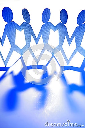 Blue people figures on white Stock Photo