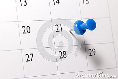 Blue pin on Calendar Stock Photo