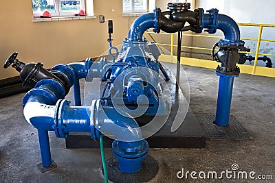 Pipes, pumps, gauges in water installation Stock Photo