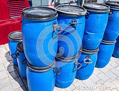 Blue plastic barrels logistic image Stock Photo