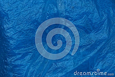 Blue plastic texture of crumpled piece of cellophane Stock Photo