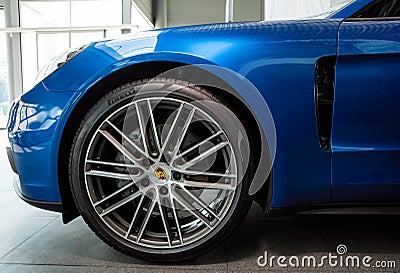 Blue Porsche panamera 4s wheel Editorial Stock Photo