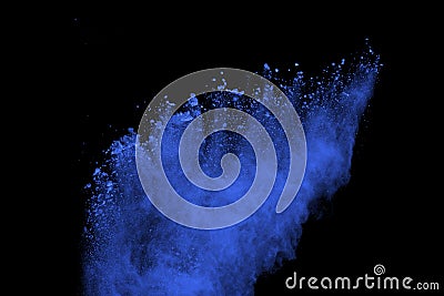 Blue powder explosion on black background. Colored cloud. Color dust explode. Paint Holi. Stock Photo