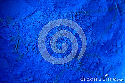 Blue powder texture close up. Cloth whitener indigo Stock Photo