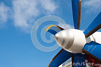 Blue propeller of white airplane Stock Photo