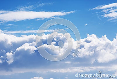 Blue puffy cloud sky Stock Photo