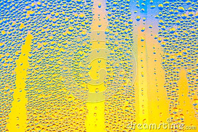 Blue raindrops on the glass Stock Photo