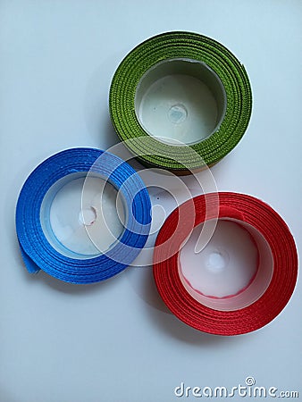 Blue, red and green strip winding on a white background Stock Photo