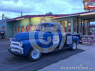 The blue retro car outside the restaurant at Kingman Editorial Stock Photo