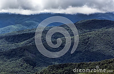 Blue Ridge Mountains and feathery clouds at Blowing Rock Stock Photo