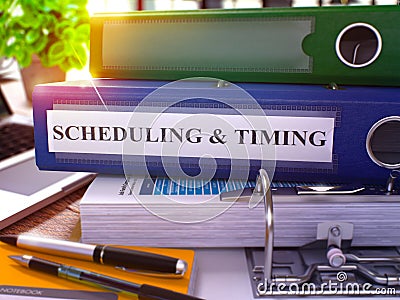 Blue Ring Binder with Inscription Scheduling and Timing. 3d. Stock Photo