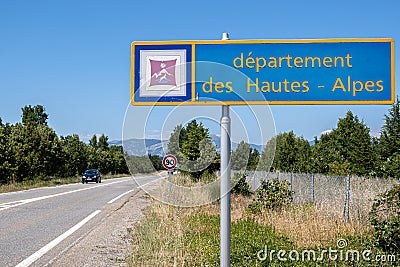 Blue road sign of welcome to the departement of Hautes Alpes in France Editorial Stock Photo