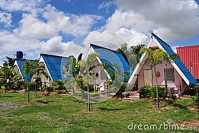 Blue roof house. Stock Photo