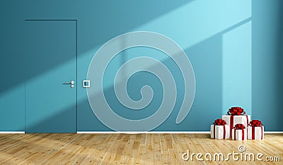 Blue room with gift on wooden floor Stock Photo