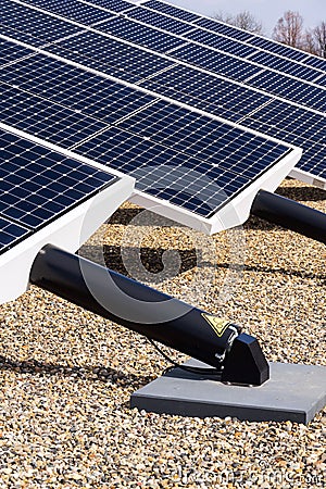 Blue rotating solar panels tilted axis tracker, future energy concept Stock Photo