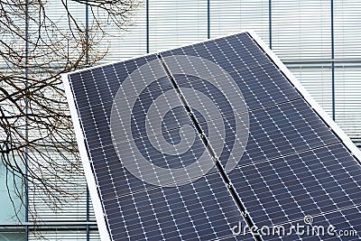 Blue rotating solar panels tilted axis tracker, future energy concept Stock Photo