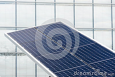 Blue rotating solar panels tilted axis tracker, future energy concept Stock Photo