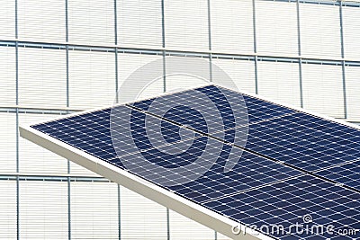 Blue rotating solar panels tilted axis tracker, future energy concept Stock Photo