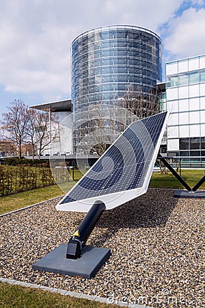 Blue rotating solar panels tilted axis tracker, future innovation energy Stock Photo