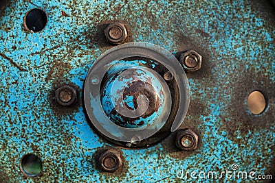 Blue rusty wheel from a tractor close up Stock Photo