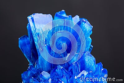 Blue salt crystal isolated on black background Stock Photo