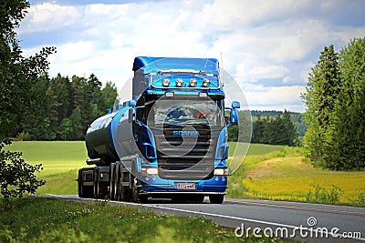 Blue Scania R500 Tank Truck on the Road at Summer Editorial Stock Photo