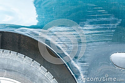 Blue scratched car with damaged paint in crash accident on the street or parking lot in the city Stock Photo