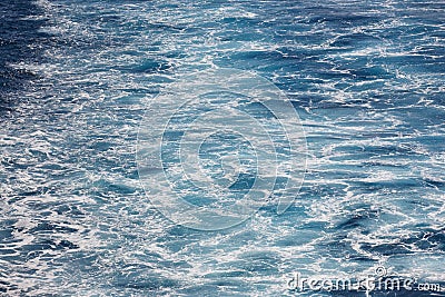 Blue sea background. Vessel ocean wake. Marine waves. Outdoor Stock Photo