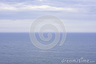Blue sea and sky with few clouds.Nature photograph.Minimalizm. Stock Photo