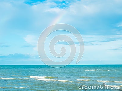 Blue Sea and Sky in Thailand with Rainbow after Raining Stock Photo