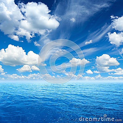 Blue sea and sky, white clouds, sunny weather Stock Photo