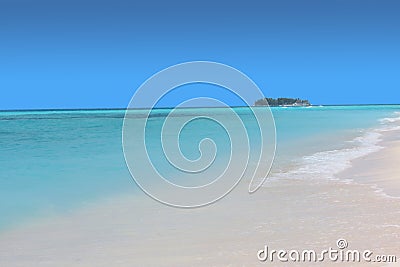 Blue sea with small deserted island Stock Photo