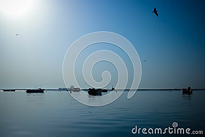 Blue sea and small yachts Stock Photo