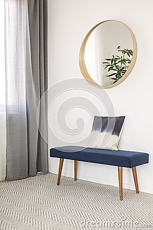 Blue settee with pillow in elegant waiting room Stock Photo