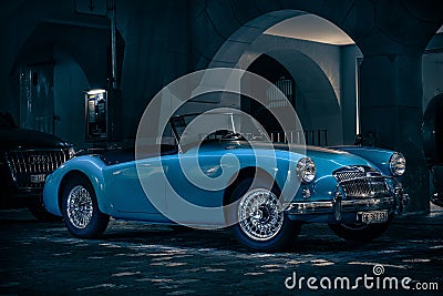 Blue shiny oldtimer on street Stock Photo