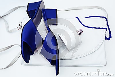 Blue shoes with handbag and perfume Stock Photo