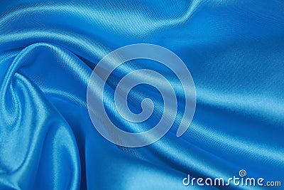 Blue Silk cloth of wavy abstract background Stock Photo